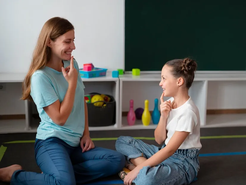 psychologist-helping-little-girl-speech-therapy